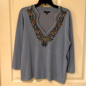 Sweater, beaded and jeweled necklace line